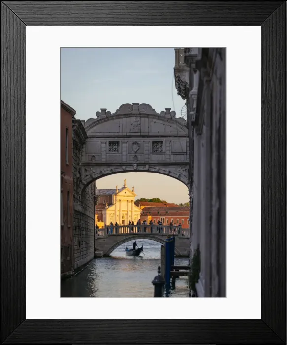 Framed Print : Venice, Veneto, Italy. Gondolier under bridge of Sighs and St George church illuminated at sunset Framed Print : Venice, Veneto, Italy. Gondolier under bridge of Sighs and St George church illuminated at sunset