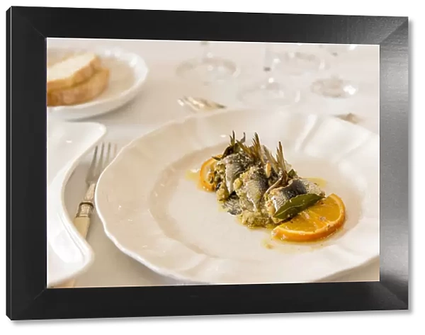 europe, Italy, Sicily. Palermo, a place setting with the Sarde Beccafico, a traditional local dish