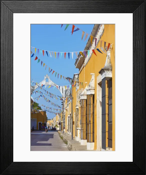 Framed Print : A yellow street of Izamal in colonial architecture, Yucatan, Mexico. Izamal is known in Yucatan as the Yellow City, as most of its buildings are painted yellow Framed Print : A yellow street of Izamal in colonial architecture, Yucatan, Mexico. Izamal is known in Yucatan as the Yellow City, as most of its buildings are painted yellow