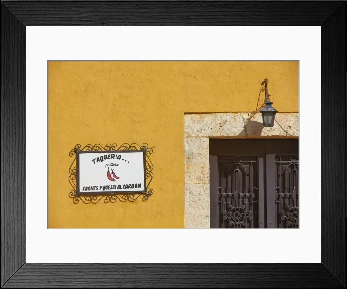 Framed Print : The signboard of a traditional Taqueria'restaurant in a street of Izamal, Yucatan, Mexico. Izamal is known in Yucatan as the Yellow City, as most of its buildings are painted yellow Framed Print : The signboard of a traditional Taqueria'restaurant in a street of Izamal, Yucatan, Mexico. Izamal is known in Yucatan as the Yellow City, as most of its buildings are painted yellow