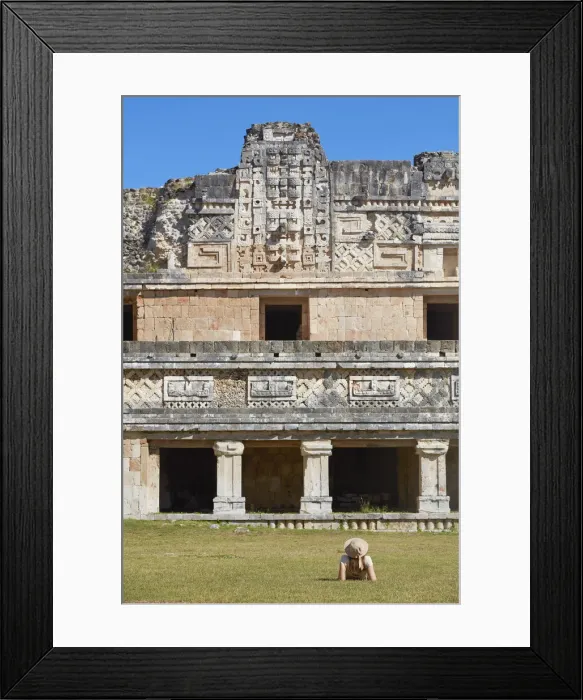 Framed Print : A tourist looking at the ancient Mayan town of Uxmal, Yucatan, Mexico. The ruins of Uxmal have been declared a UNESCO World Heritage Site in 1996. (MR) Framed Print : A tourist looking at the ancient Mayan town of Uxmal, Yucatan, Mexico. The ruins of Uxmal have been declared a UNESCO World Heritage Site in 1996. (MR)