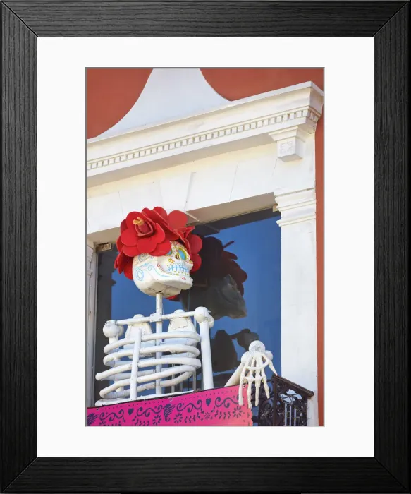 Framed Print : A Calaca'(Mexican skeleton) on the balcony of a restaurant in the historical cask of Campeche, Yucatan, Mexico. It is commonly used for decoration during the Mexican Day of the Dead festival Framed Print : A Calaca'(Mexican skeleton) on the balcony of a restaurant in the historical cask of Campeche, Yucatan, Mexico. It is commonly used for decoration during the Mexican Day of the Dead festival