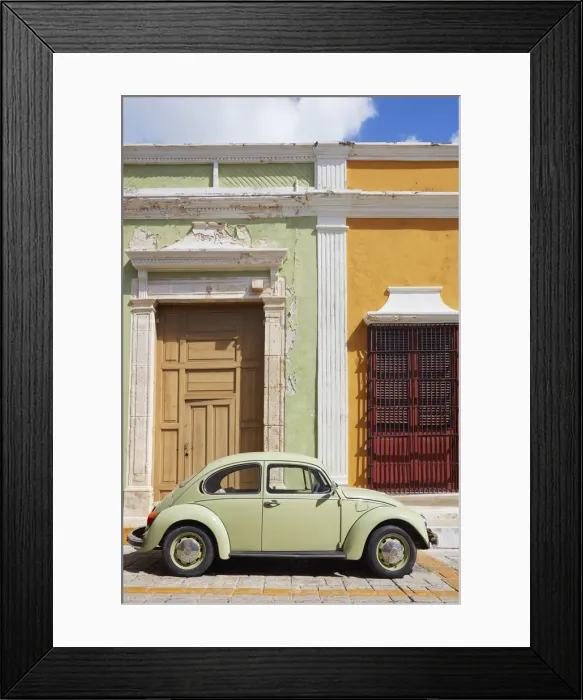 Framed Print : A vintage Volkswagen Bettle on a street of the historic center of Campeche with colorful houses in colonial architecture in the background, Yucatan, Mexico Framed Print : A vintage Volkswagen Bettle on a street of the historic center of Campeche with colorful houses in colonial architecture in the background, Yucatan, Mexico