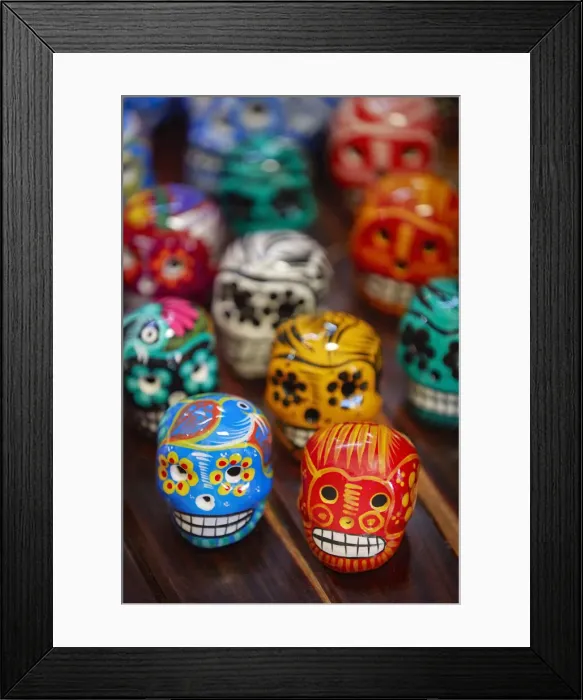 Framed Print : Colorful Mexican skullls (Calaca) on sale in a souvenir shop of the Campeche historical cask, Yucatan, Mexico. The Calaca is commonly used for decoration during the Mexican Day of the Dead festival Framed Print : Colorful Mexican skullls (Calaca) on sale in a souvenir shop of the Campeche historical cask, Yucatan, Mexico. The Calaca is commonly used for decoration during the Mexican Day of the Dead festival