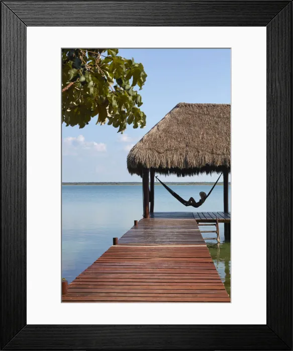 Framed Print : Girl with hat in a hammock looking at Bacalar lagoon from a pier, Quintana Roo, Yucatan, Mexico. (MR) Framed Print : Girl with hat in a hammock looking at Bacalar lagoon from a pier, Quintana Roo, Yucatan, Mexico. (MR)