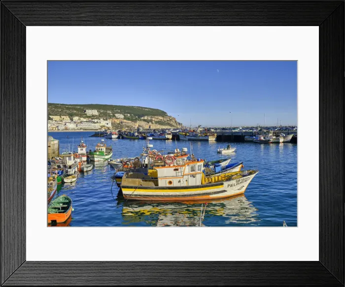Framed Print : Colourful fishing boats at the Sesimbra fishing harbour. Portugal