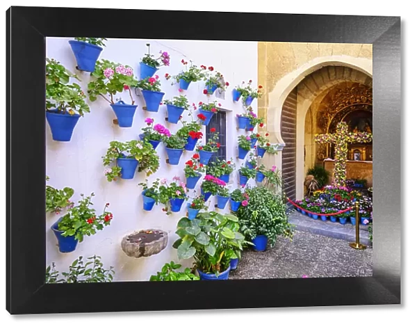 Chapel of San Basilio district, full of flowers during the Cruces de Mayo (May Crosses) Festival. Cordoba, Andalucia. Spain
