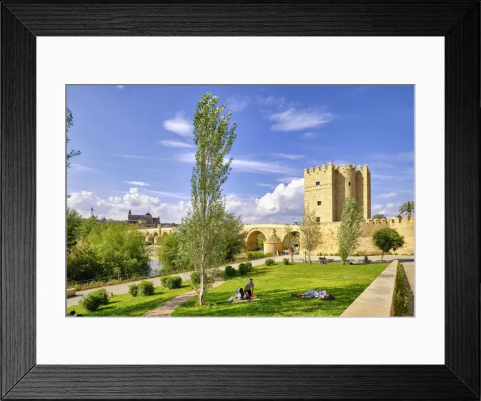 Framed Print : The Roman Bridge (Puente Romano) over Guadalquivir River and the Calahorra Tower, a fortified gate. A UNESCO World Heritage Site, Cordoba. Andalucia, Spain Framed Print : The Roman Bridge (Puente Romano) over Guadalquivir River and the Calahorra Tower, a fortified gate. A UNESCO World Heritage Site, Cordoba. Andalucia, Spain