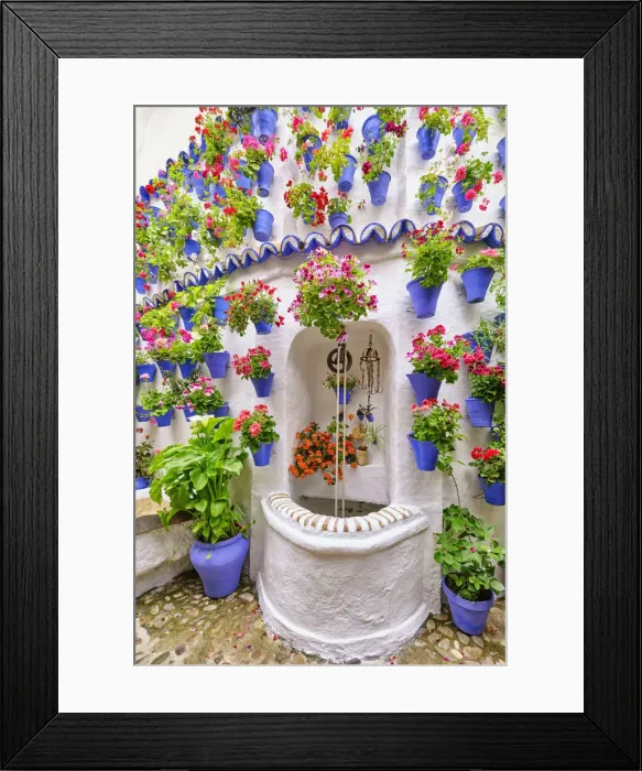 Framed Print : The well, for centuries the central piece of the patios in Cordoba. A UNESCO Intangible Cultural Heritage of Humanity. Cordoba, Andalucia. Spain Framed Print : The well, for centuries the central piece of the patios in Cordoba. A UNESCO Intangible Cultural Heritage of Humanity. Cordoba, Andalucia. Spain