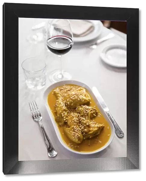 Spain, Madrid, Casa Ciriaco, A plate of chicken in pepitoria