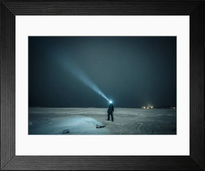 Framed Print : Man exploring the sky at night on a iced lake on the arctic circle, Abisko, Sweden Framed Print : Man exploring the sky at night on a iced lake on the arctic circle, Abisko, Sweden