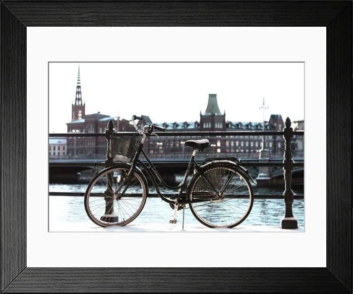 Framed Print : Bicycle near the river in Stockholm, winter day, snow. Sweden, Europe Framed Print : Bicycle near the river in Stockholm, winter day, snow. Sweden, Europe