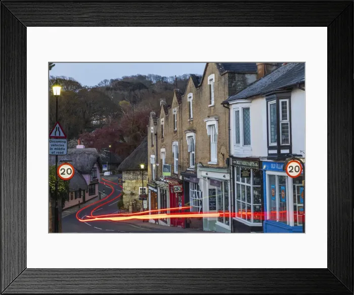 Framed Print : England, Isle of Wight, Shanklin Old Village, Row of Shops and Empty Road Framed Print : England, Isle of Wight, Shanklin Old Village, Row of Shops and Empty Road