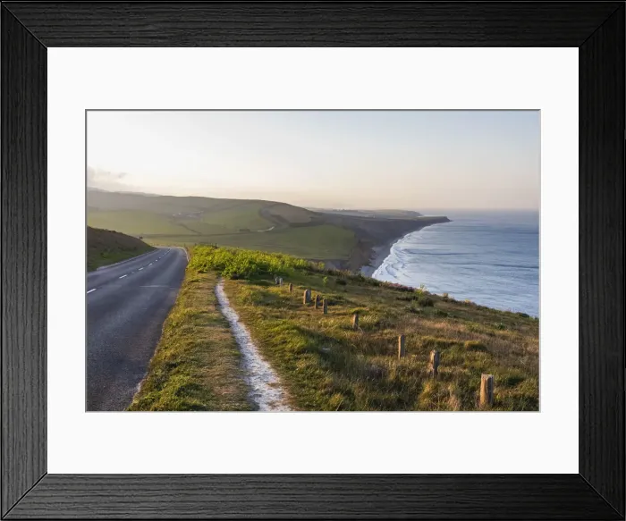 Framed Print : England, Isle of Wight, Coastal View of Road and Hiking Path with Brightstone Bay in the Distance Framed Print : England, Isle of Wight, Coastal View of Road and Hiking Path with Brightstone Bay in the Distance