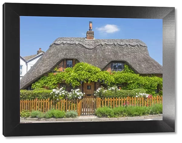 England, Hampshire, Test Valley, Kings Somborne, Traditional Thatched Roof House