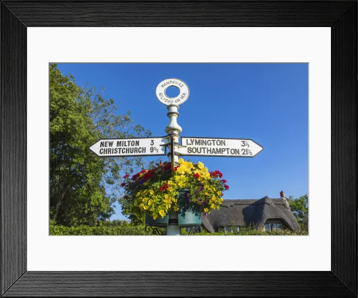 Framed Print : England, Hampshire, The New Forest, Milford-on-sea, Signpost and Flower Basket