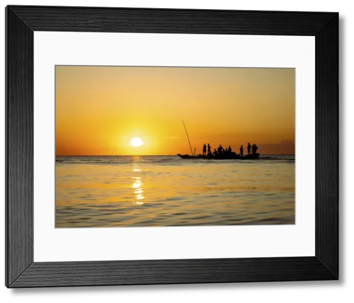 Framed Print : Fishermen returning home on dhow at sunset, , Indian Ocean, Zanzibar, Tanzania Framed Print : Fishermen returning home on dhow at sunset, , Indian Ocean, Zanzibar, Tanzania