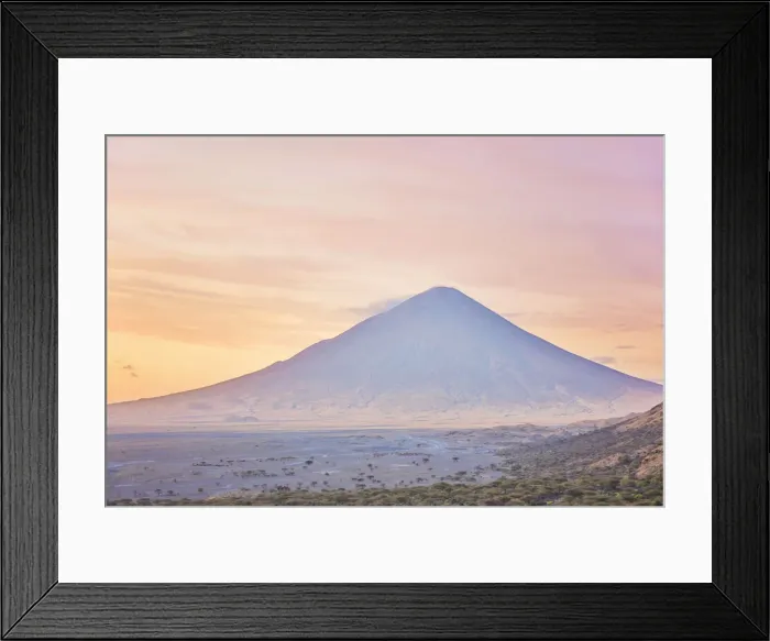 Framed Print : The Ol Doinyo Lengai'volcano at sunrise, Arusha Region, Tanzania. An active volcano in the Gregory Rift, south of Lake Natron, considered by the Msai people as The Mountain of God Framed Print : The Ol Doinyo Lengai'volcano at sunrise, Arusha Region, Tanzania. An active volcano in the Gregory Rift, south of Lake Natron, considered by the Msai people as The Mountain of God