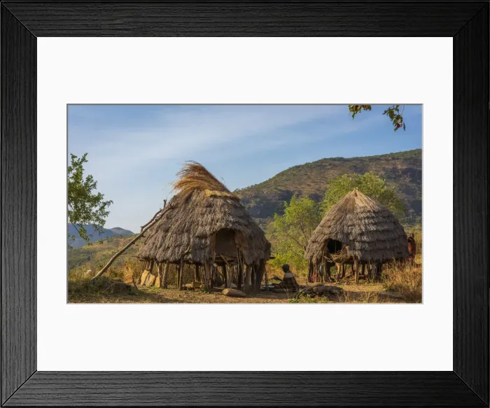 Framed Print : Africa, Uganda, Karamoja. Moroto. Dodoth village at the slopes of the Mount Moroto with the traditional buildings Framed Print : Africa, Uganda, Karamoja. Moroto. Dodoth village at the slopes of the Mount Moroto with the traditional buildings