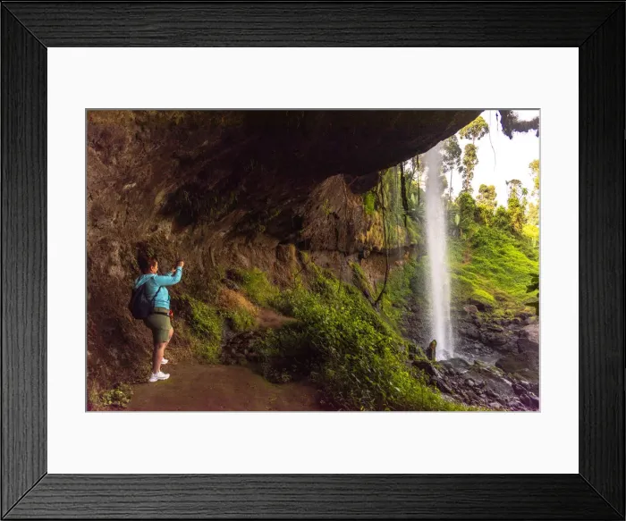 Framed Print : Africa, Uganda, Sipi Falls. A person taking pictures behind the falls Framed Print : Africa, Uganda, Sipi Falls. A person taking pictures behind the falls