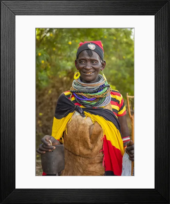 Framed Print : Africa, Uganda, Karamoja. Namalu. A beautiful elder woman during a wedding ceremony traditionally dressed Framed Print : Africa, Uganda, Karamoja. Namalu. A beautiful elder woman during a wedding ceremony traditionally dressed