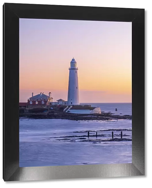 UK, England, Tyne and Wear, North Tyneside, Whitley Bay, St Marys Island, St. Marys Lighthouse at sunrise