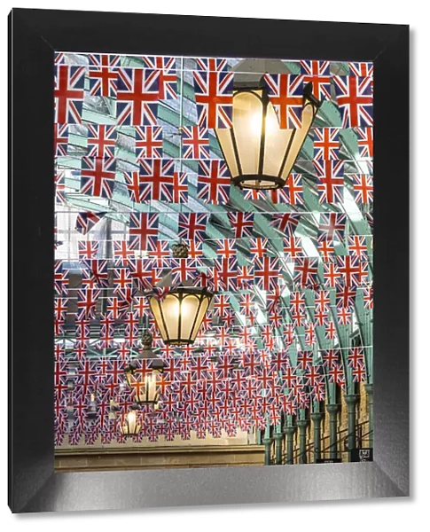 Union Jaclk flags in Covent Garden market, London, England, UK