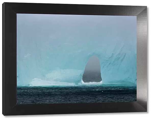 Opening in iceberg floating in the Drake Passage, Antarctica