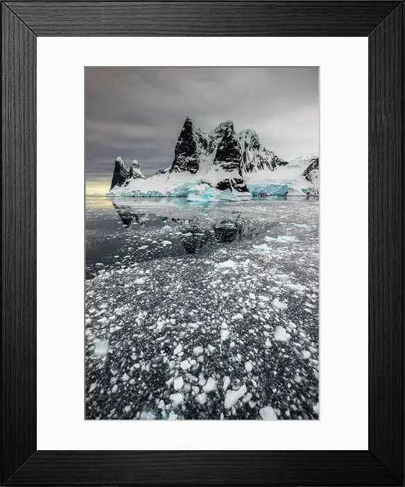 Framed Print : Brash ice floating below Una Peaks at False Cape Renard, Lemaire Channel, Antarctica Framed Print : Brash ice floating below Una Peaks at False Cape Renard, Lemaire Channel, Antarctica