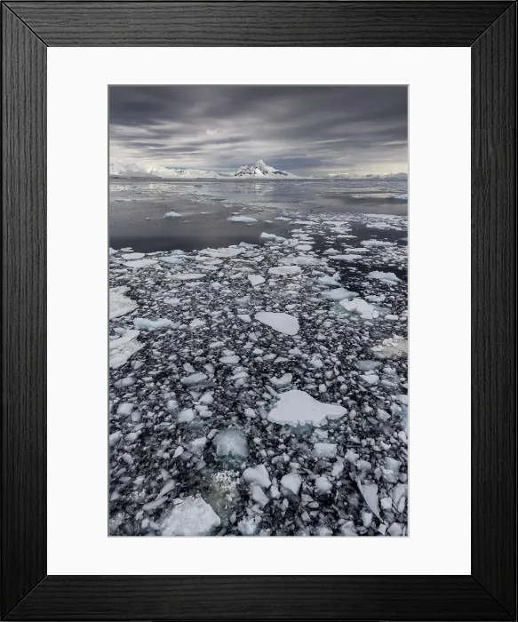Framed Print : Brash ice & distant mountains on the Lemaire Channel, Antarctica Framed Print : Brash ice & distant mountains on the Lemaire Channel, Antarctica