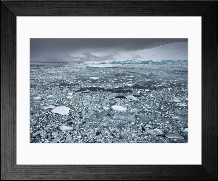 Framed Print : Brash ice & distant mountain on the Lemaire Channel, Antarctica Framed Print : Brash ice & distant mountain on the Lemaire Channel, Antarctica
