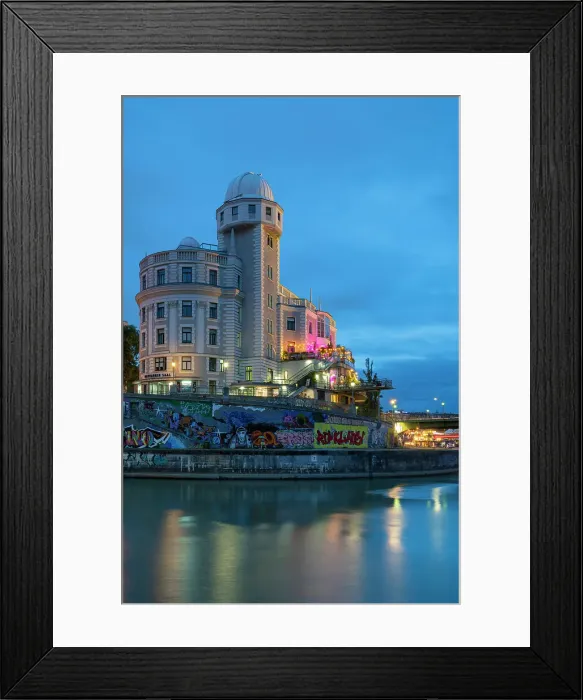 Framed Print : Illuminated Urania Observatory by Danube river canal at twilight, Innere Stadt, Vienna, Austria Framed Print : Illuminated Urania Observatory by Danube river canal at twilight, Innere Stadt, Vienna, Austria