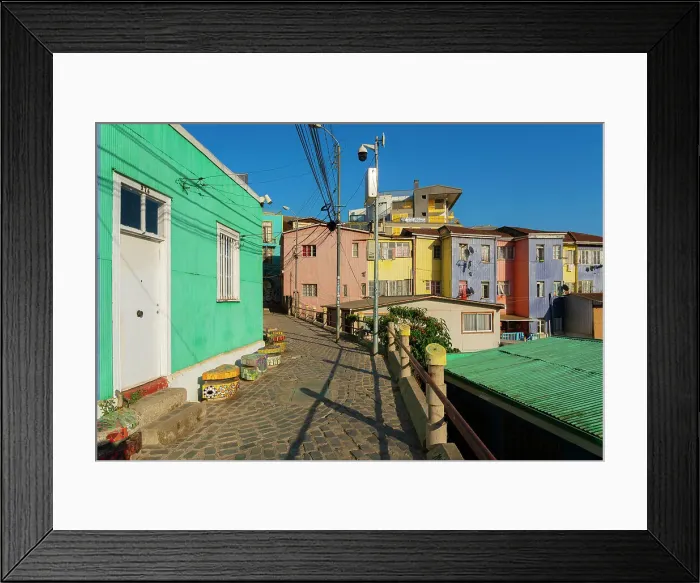 Framed Print : Empty lane amidst colorful houses, Cerro Bellavista, Valparaiso, Valparaiso Province, Valparaiso Region, Chile Framed Print : Empty lane amidst colorful houses, Cerro Bellavista, Valparaiso, Valparaiso Province, Valparaiso Region, Chile