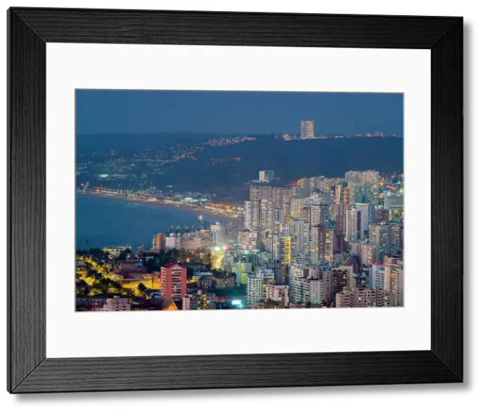 Framed Print : Elevated view of high-rise buildings of Vina del Mar at twilight, Valparaiso Province, Valparaiso Region, Chile Framed Print : Elevated view of high-rise buildings of Vina del Mar at twilight, Valparaiso Province, Valparaiso Region, Chile