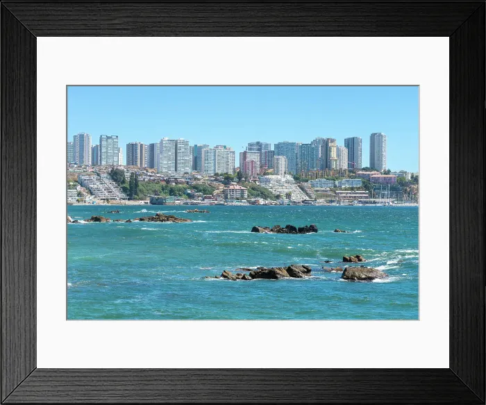 Framed Print : Distant view of residential high-rise buildings by sea, Concon, Valparaiso Province, Valparaiso Region, Chile Framed Print : Distant view of residential high-rise buildings by sea, Concon, Valparaiso Province, Valparaiso Region, Chile
