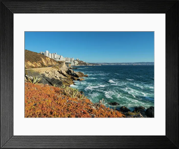 Framed Print : Rocky coastline by Roca Oceanica with distant view of residential high-rise buildings in Renaca, Concon, Valparaiso Province, Valparaiso Region, Chile Framed Print : Rocky coastline by Roca Oceanica with distant view of residential high-rise buildings in Renaca, Concon, Valparaiso Province, Valparaiso Region, Chile