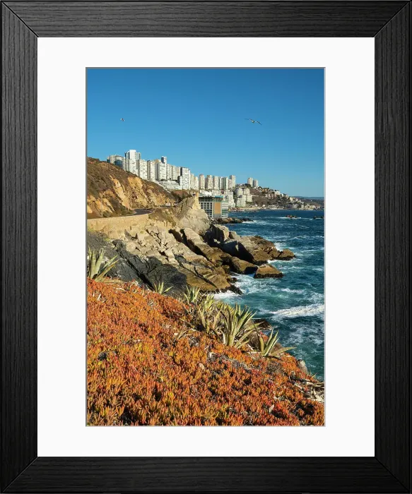 Framed Print : Rocky coastline by Roca Oceanica with distant view of residential high-rise buildings in Renaca, Concon, Valparaiso Province, Valparaiso Region, Chile Framed Print : Rocky coastline by Roca Oceanica with distant view of residential high-rise buildings in Renaca, Concon, Valparaiso Province, Valparaiso Region, Chile