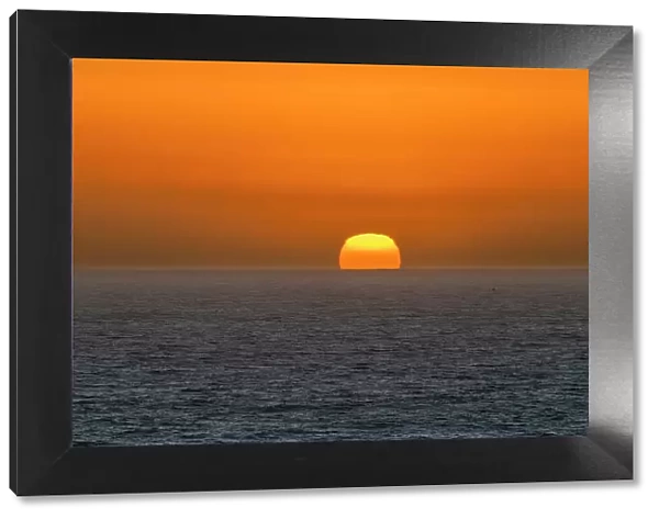 Sun setting into sea, Concon, Valparaiso Province, Valparaiso Region, Chile