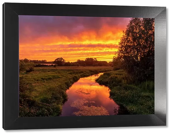Sunset Reflecting in River Yare, Marston Marsh, Norwich, England