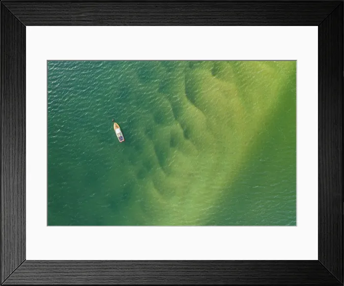 Framed Print : Aerial view of Padstow speedboat Fireball moored in the Camel Estuary, Padstow, Cornwall, England. Spring (April) 2022 Framed Print : Aerial view of Padstow speedboat Fireball moored in the Camel Estuary, Padstow, Cornwall, England. Spring (April) 2022