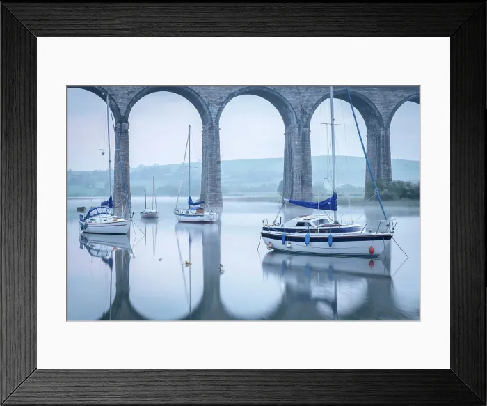 Framed Print : Yachts moored below the majestic viaduct at St Germans at dawn, Cornwall, England. Spring (April) 2022 Framed Print : Yachts moored below the majestic viaduct at St Germans at dawn, Cornwall, England. Spring (April) 2022