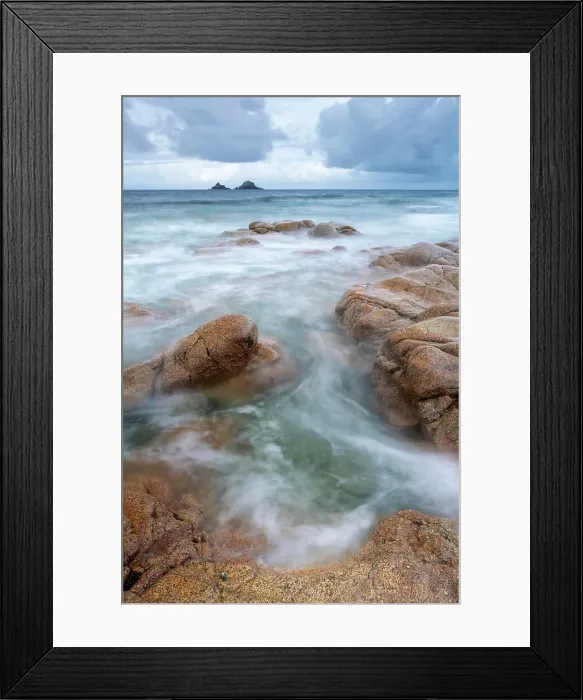 Framed Print : The Brisons islands from the rocky shores of Nanven, near St Just in Cornwall, England. Spring (May) 2022 Framed Print : The Brisons islands from the rocky shores of Nanven, near St Just in Cornwall, England. Spring (May) 2022