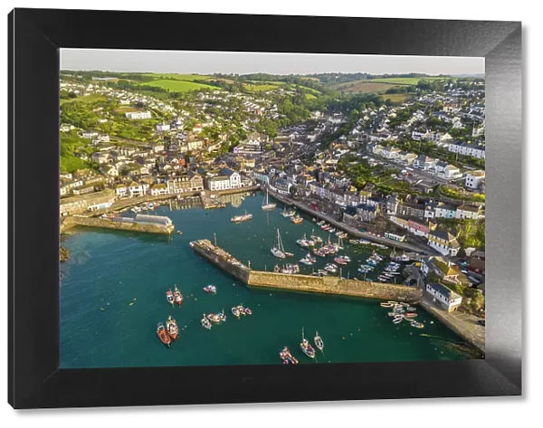 Aerial view of Mevagissey harbour on the south coast of Cornwall, England. Spring (June) 2022
