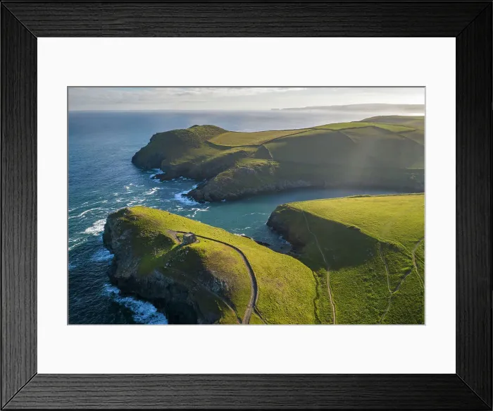 Framed Print : Aerial view of Doyden Castle and Port Quin surrounded by rugged Cornish coastline, Cornwall, England. Spring (June) 2022 Framed Print : Aerial view of Doyden Castle and Port Quin surrounded by rugged Cornish coastline, Cornwall, England. Spring (June) 2022