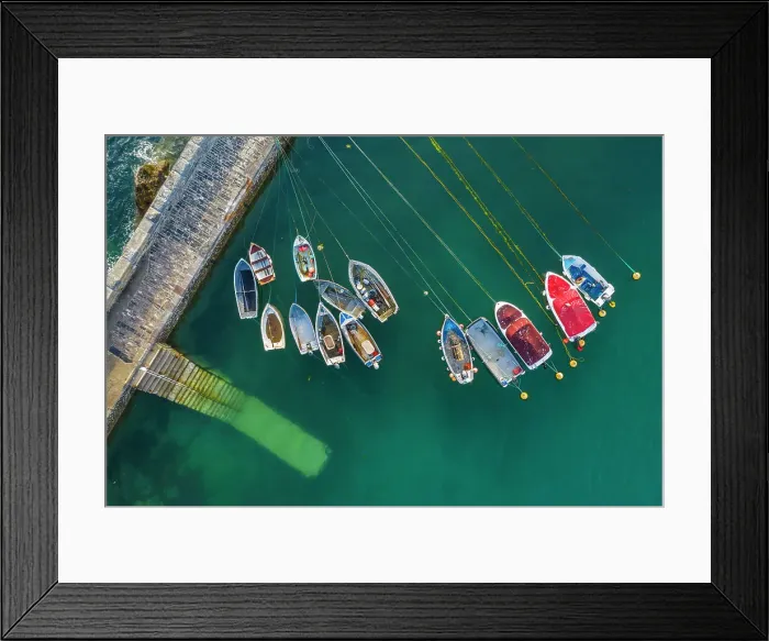 Framed Print : Aerial view of fishing boats in Mevagissey Harbour, Cornwall, England. Spring (June) 2022