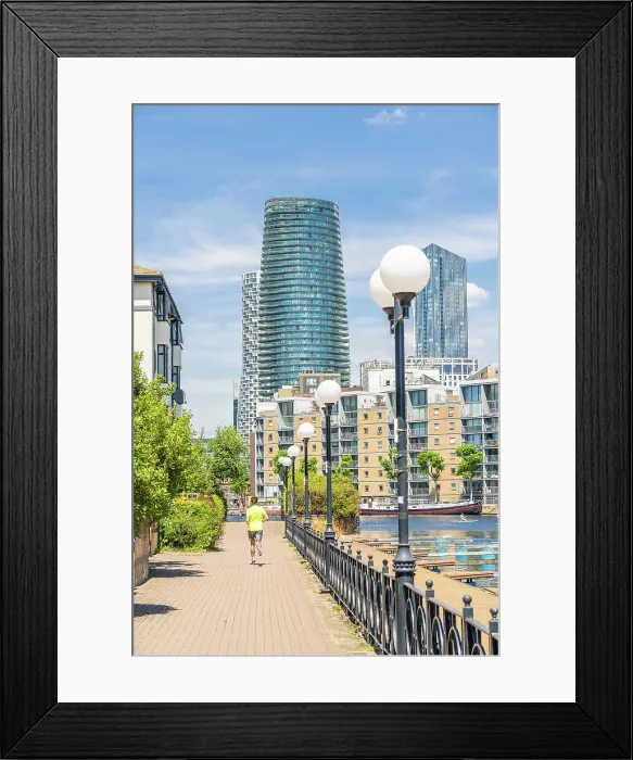 Framed Print : A person running in Millwall Outer Dock, Canary wharf, London, England, Uk Framed Print : A person running in Millwall Outer Dock, Canary wharf, London, England, Uk