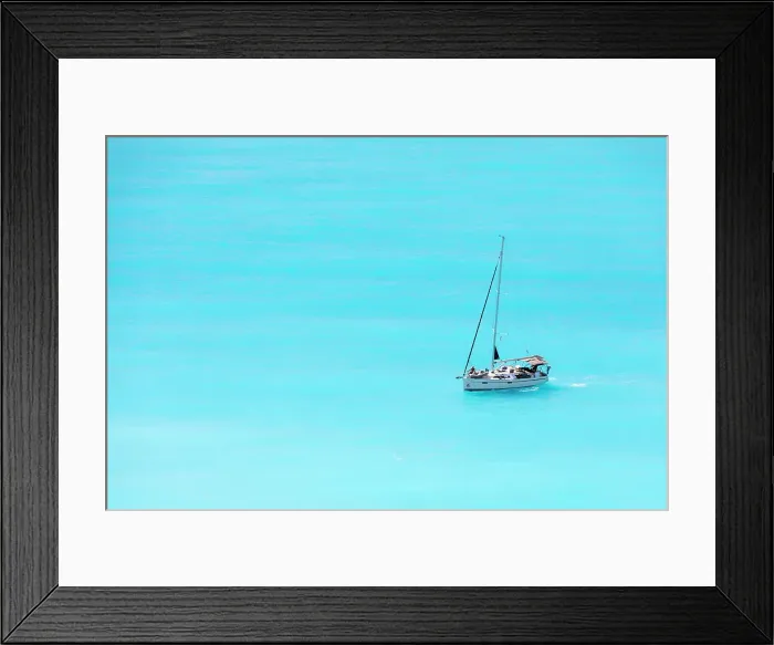 Framed Print : A sailing boat in Myrtos Bay, Kefalonia, Ionian Islands, Greece Framed Print : A sailing boat in Myrtos Bay, Kefalonia, Ionian Islands, Greece