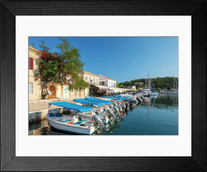 Framed Print : Waterfront cafes at Fiskardo Harbour, Kefalonia, Ionian Islands, Greece