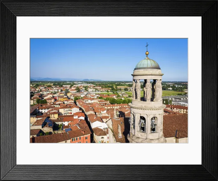 Framed Print : Italy, Lombardy, Bergamo, Urgnano, Elevated view town center with the bell tower of the parochial church on the foreground Framed Print : Italy, Lombardy, Bergamo, Urgnano, Elevated view town center with the bell tower of the parochial church on the foreground