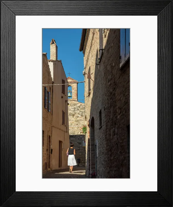 Framed Print : europe, Italy, The Marches. A woman walking in a narrow street in the beautiful hamlet of Torre di Palme near Fermo Framed Print : europe, Italy, The Marches. A woman walking in a narrow street in the beautiful hamlet of Torre di Palme near Fermo